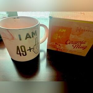 Ceramic “I am 49 + middle finger” pink mug